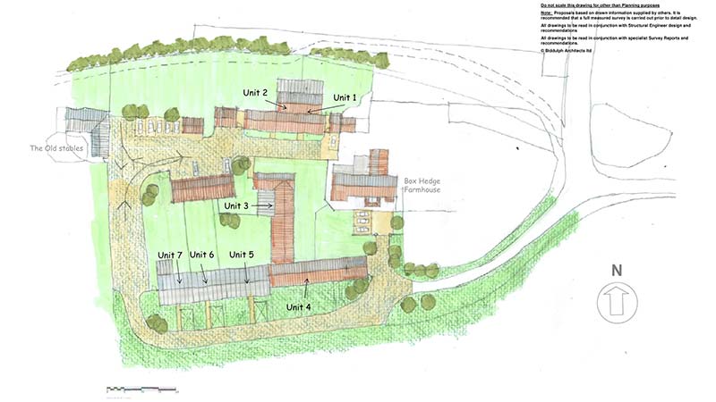 an architect drawing plan sketch of farm units