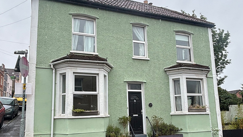 house painted green requiring a survey for a crack