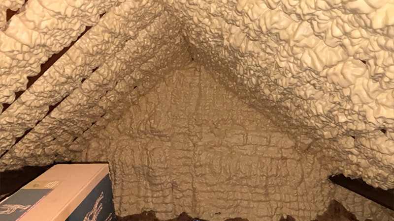 an attic with spray foam insulation