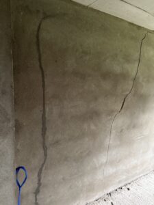 interior wall of property with two cracks